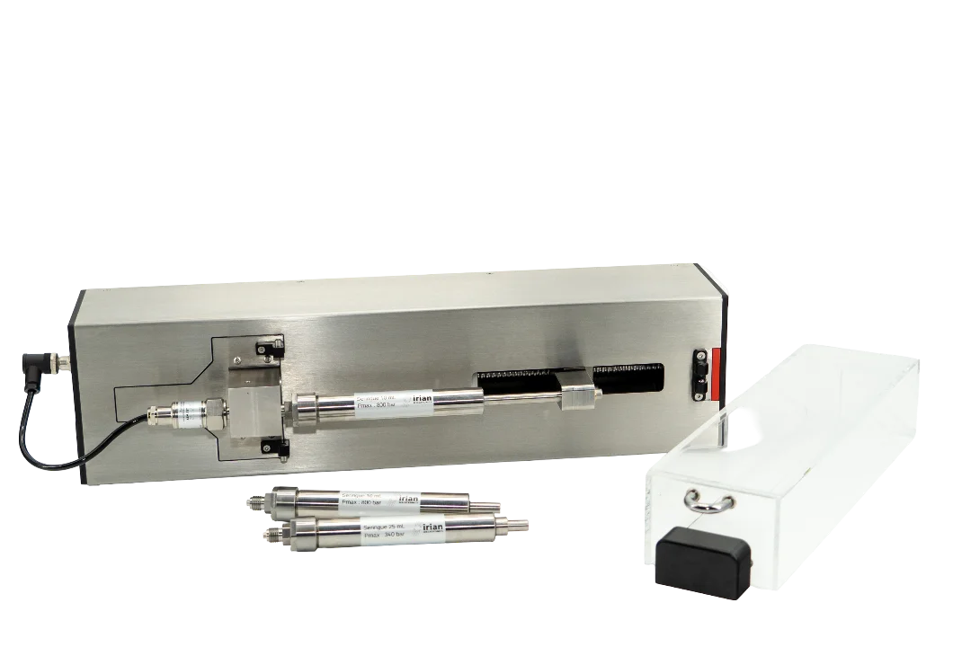 IRIAN MECATRONICS 600 bar syringe pump system with its drive unit and interchangeable stainless steel syringe modules for high-pressure fluid injection.